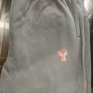 Bundle of UA Sweatpants with Texas Tech Logo